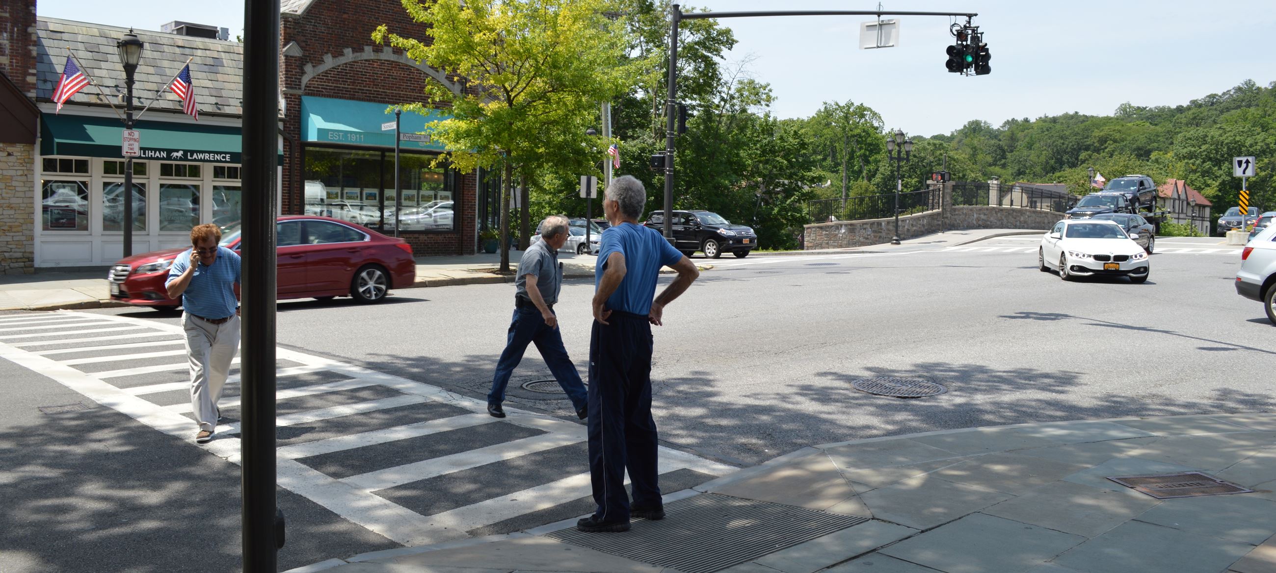 Pedestrians Crossing On green with cell phone (jpg)